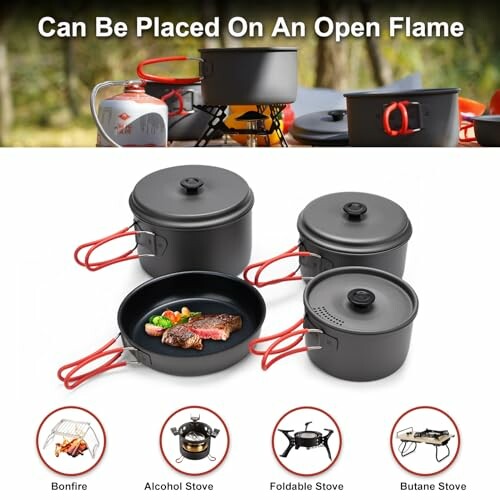 Camping cookware set with pots and pans on open flame