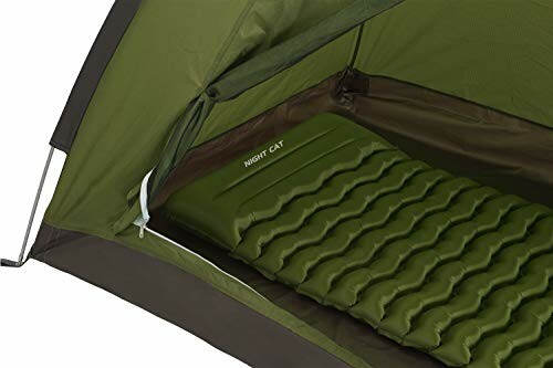 Inside view of a camping tent with a green inflatable sleeping pad.