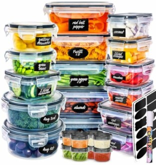 Stacked food storage containers filled with various colorful fruits and vegetables.