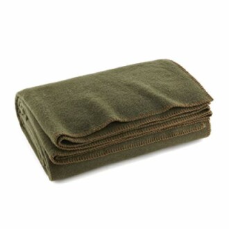 Folded green blanket with brown stitching