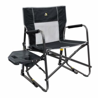 Folding camping chair with attached side table and cup holder.