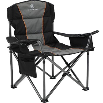 Black and gray folding camping chair with armrests and cup holder.