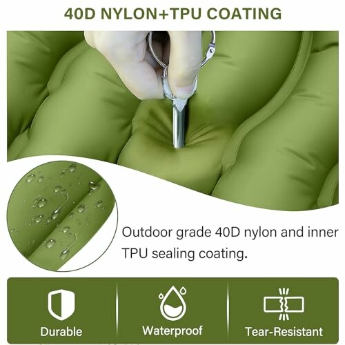 Testing durability of green inflatable mat with key against surface, highlighting outdoor grade nylon and TPU coating features like durability, waterproof, and tear-resistant.