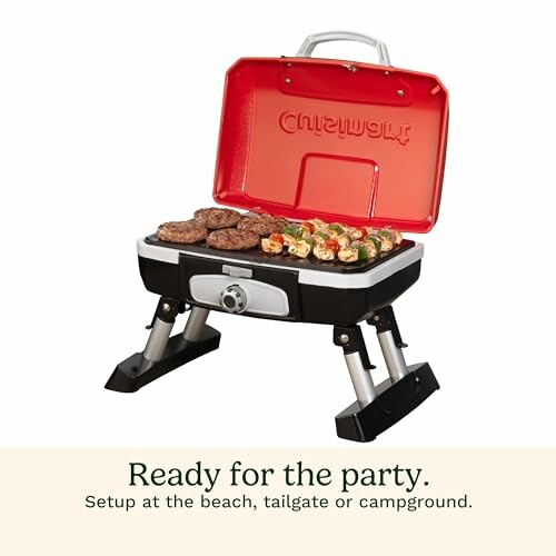 Portable grill with burgers and skewers ready for a party