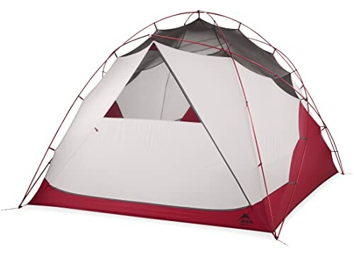 Red and white camping tent with a mesh top.