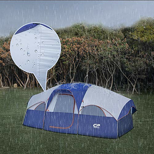 Large waterproof camping tent in the rain with trees in background